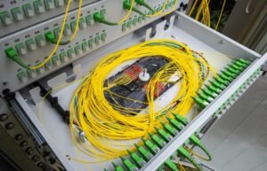 stock-photo-optical-distribution-frame-with-fibre-optic-splice-tray-1983621437-300x193